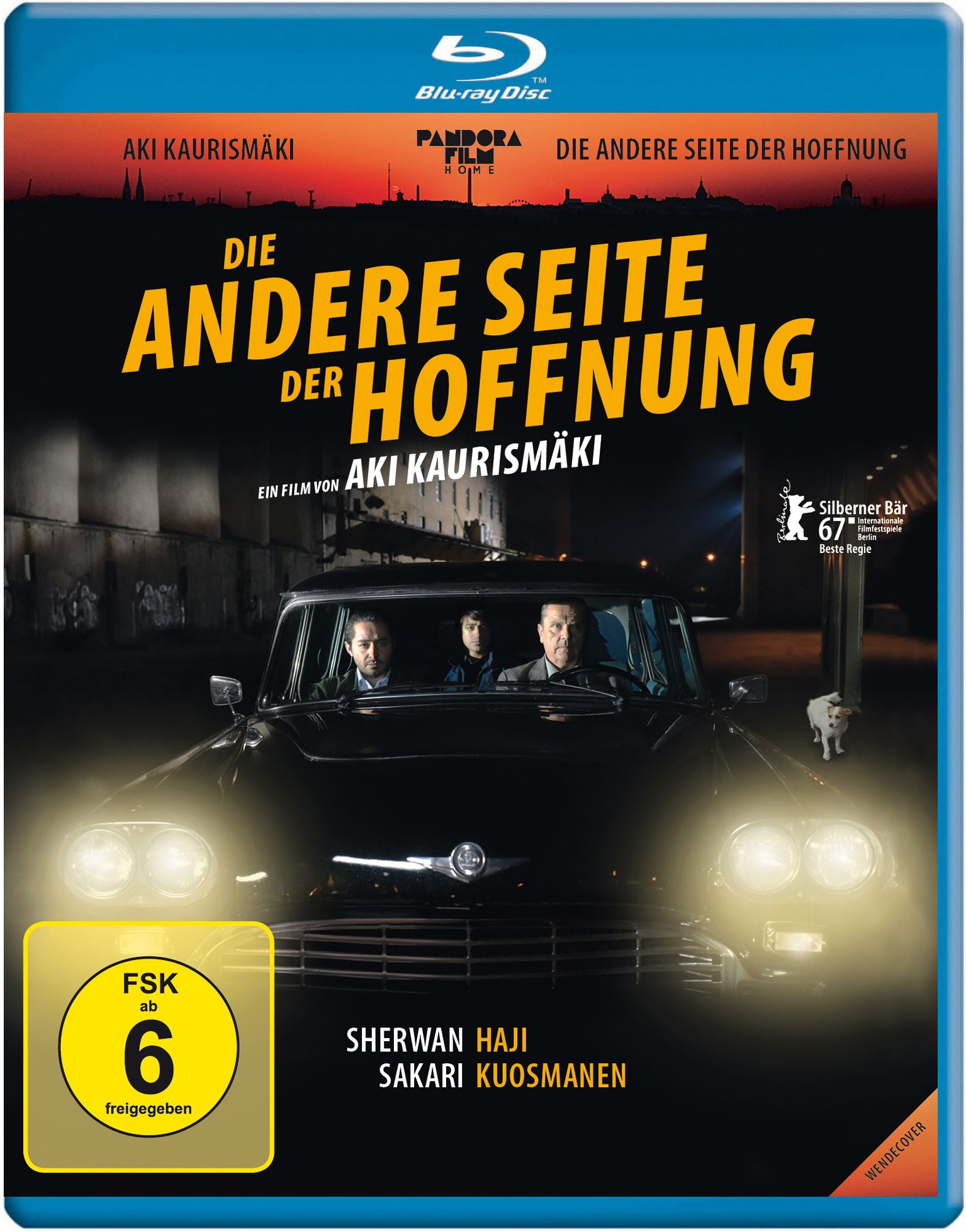 Blu-ray-Cover für 'Die andere Seite der Hoffnung', mit Schauspielern in einem Auto vor Stadtkulisse.