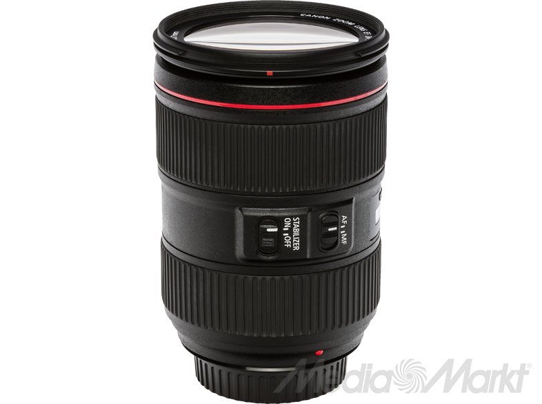 Egy Canon zoom objektív, fekete, piros díszítéssel. Van rajta fókuszgyűrű és stabilizátor.