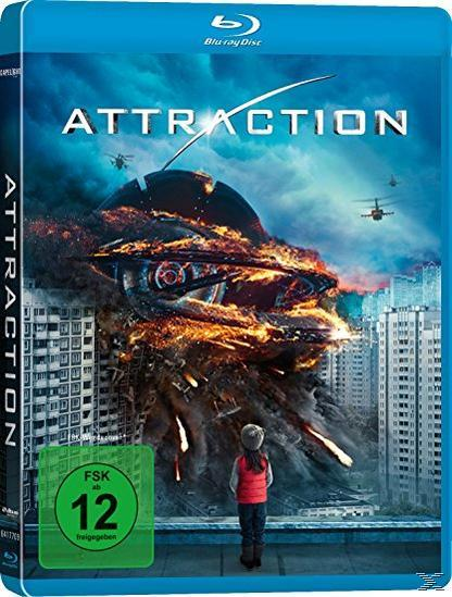 DVD-Cover des Films Attraction, das eine Stadt zeigt, die von einem Raumschiff angegriffen wird.