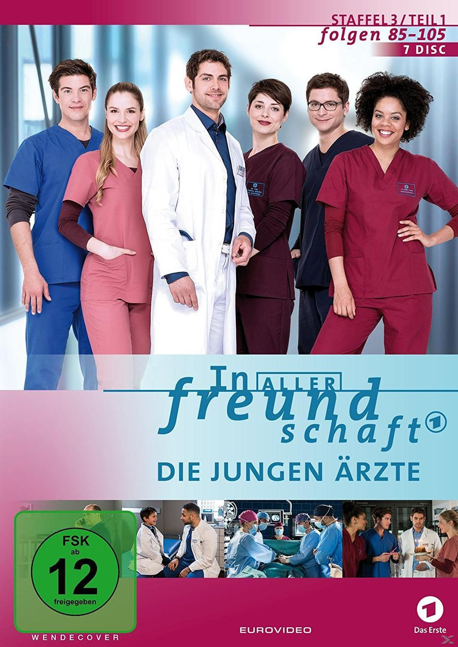 DVD-Cover für eine deutsche Fernsehserie. Mehrere Ärzte, mit Krankenhaus im Hintergrund.