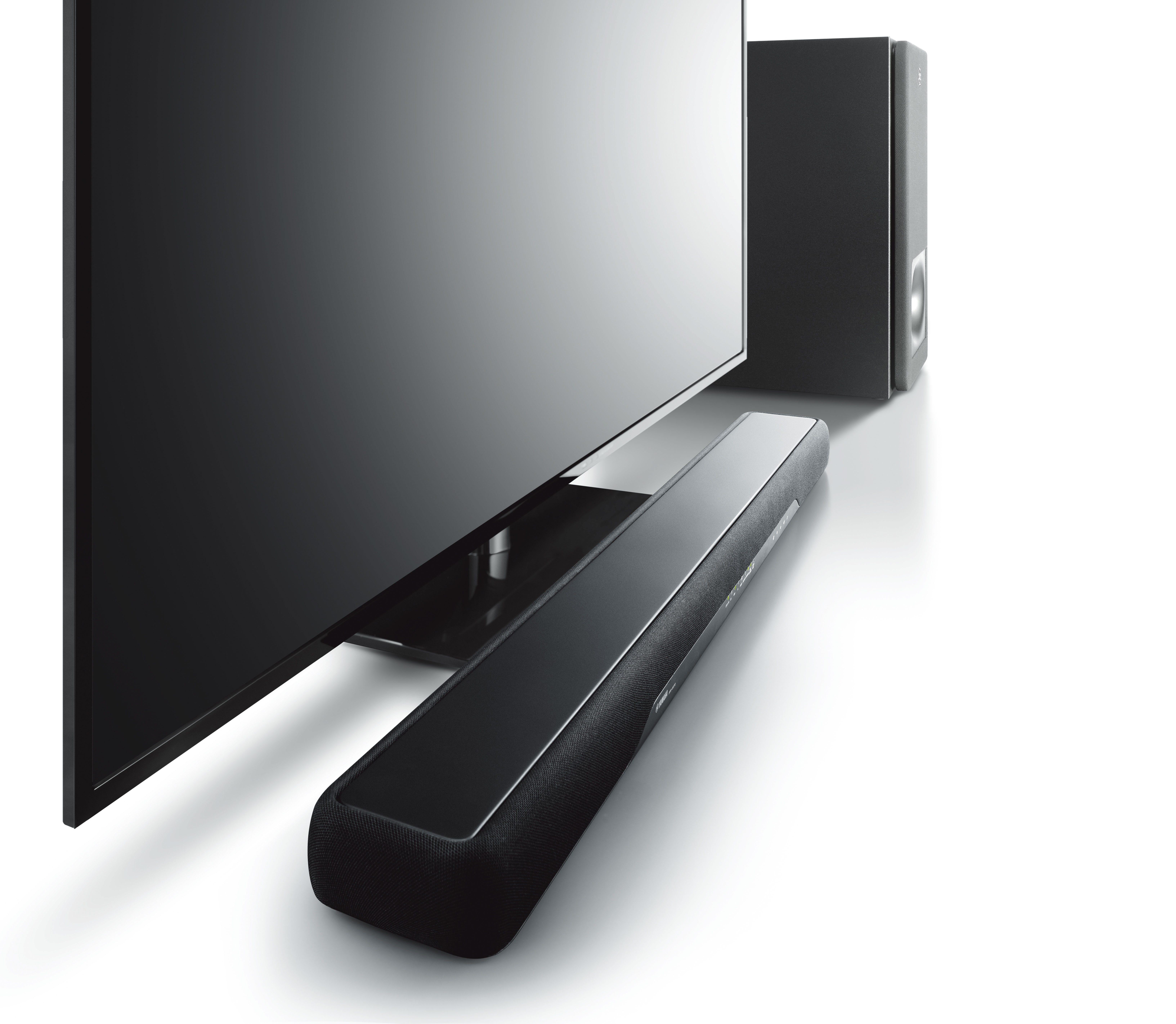 Schwarzes Soundsystem mit Soundbar und Subwoofer auf weißem Hintergrund.