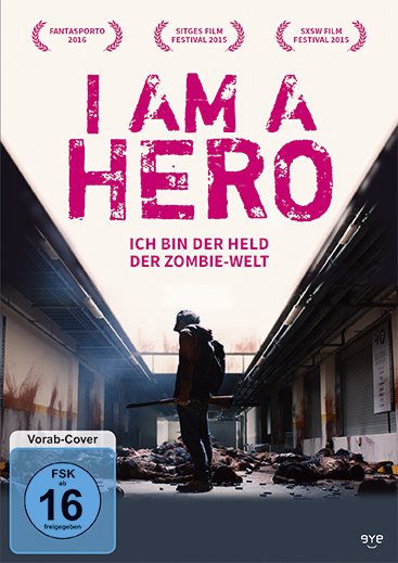 Filmplakat für 'I Am a Hero'. Zeigt einen Mann mit einer Waffe in einer postapokalyptischen Umgebung.
