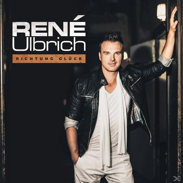 Albumcover mit René Ulbrich. Er lehnt an einer Tür, trägt eine Lederjacke und ein weißes Hemd.