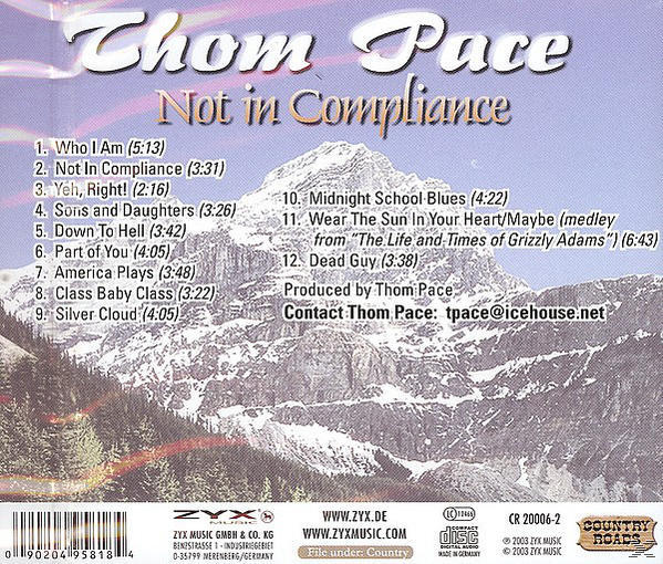 CD-Cover für Thom Paces Album Not in Compliance, mit einer Berglandschaft.