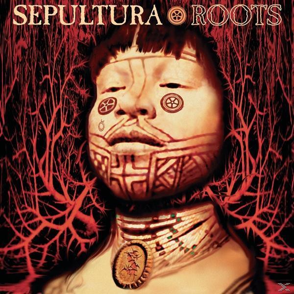 Sepultura-Albumcover. Gesicht mit Stammesmarkierungen. Roter Hintergrund mit baumartigen Adern.