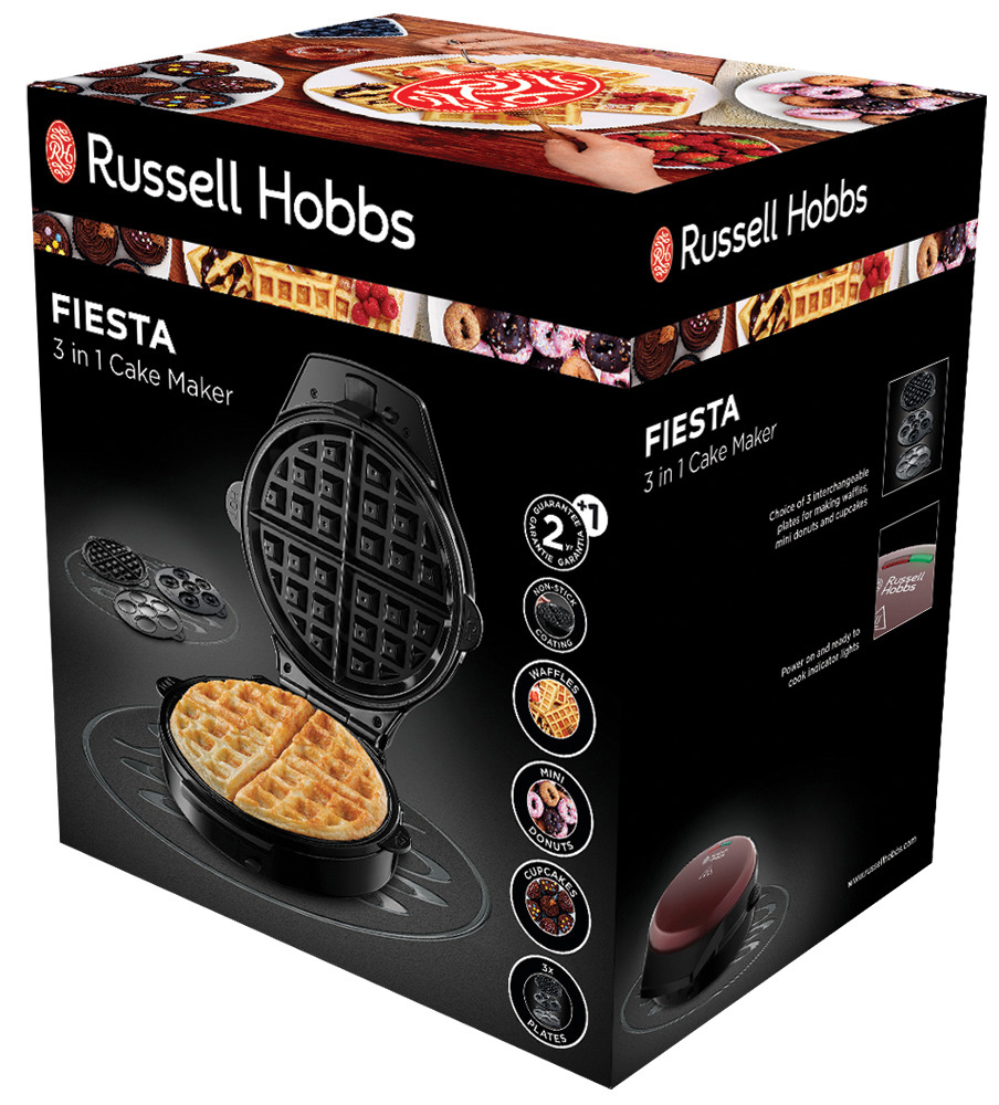 Ein schwarzer Russell Hobbs Fiesta Kuchenmacher in seiner Box, der Waffeln und Kuchen zeigt.