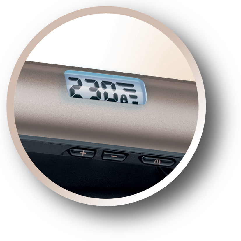 A close-up of a hair straightener's display showing a temperature of 230 degrees.