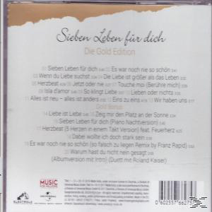 Die Rückseite einer CD-Hülle mit Titellisten auf Deutsch und goldenem Hintergrund.