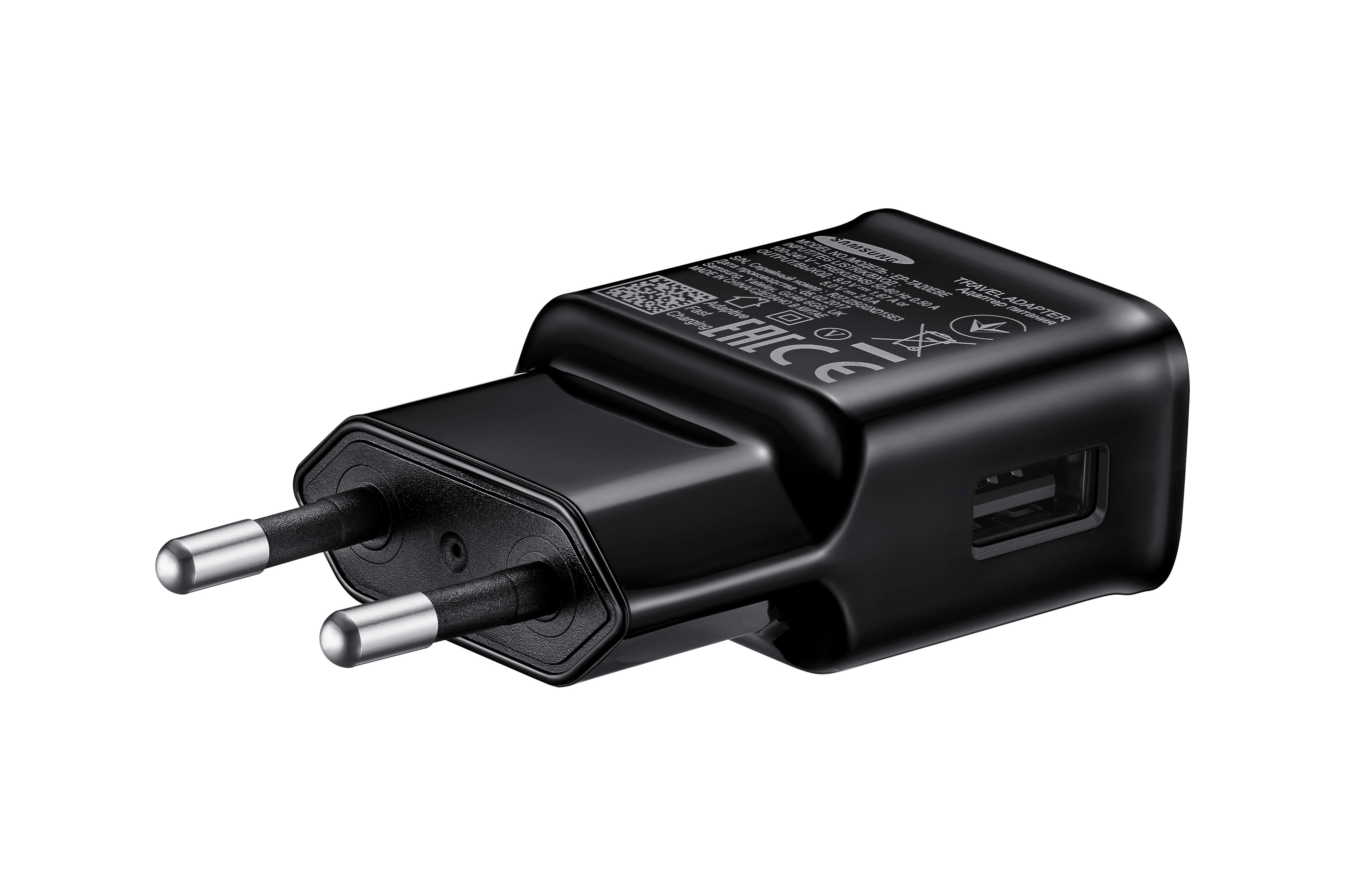 Schwarzes Samsung Ladegerät mit zwei Stiften und einem USB-Anschluss. Weißer Hintergrund.