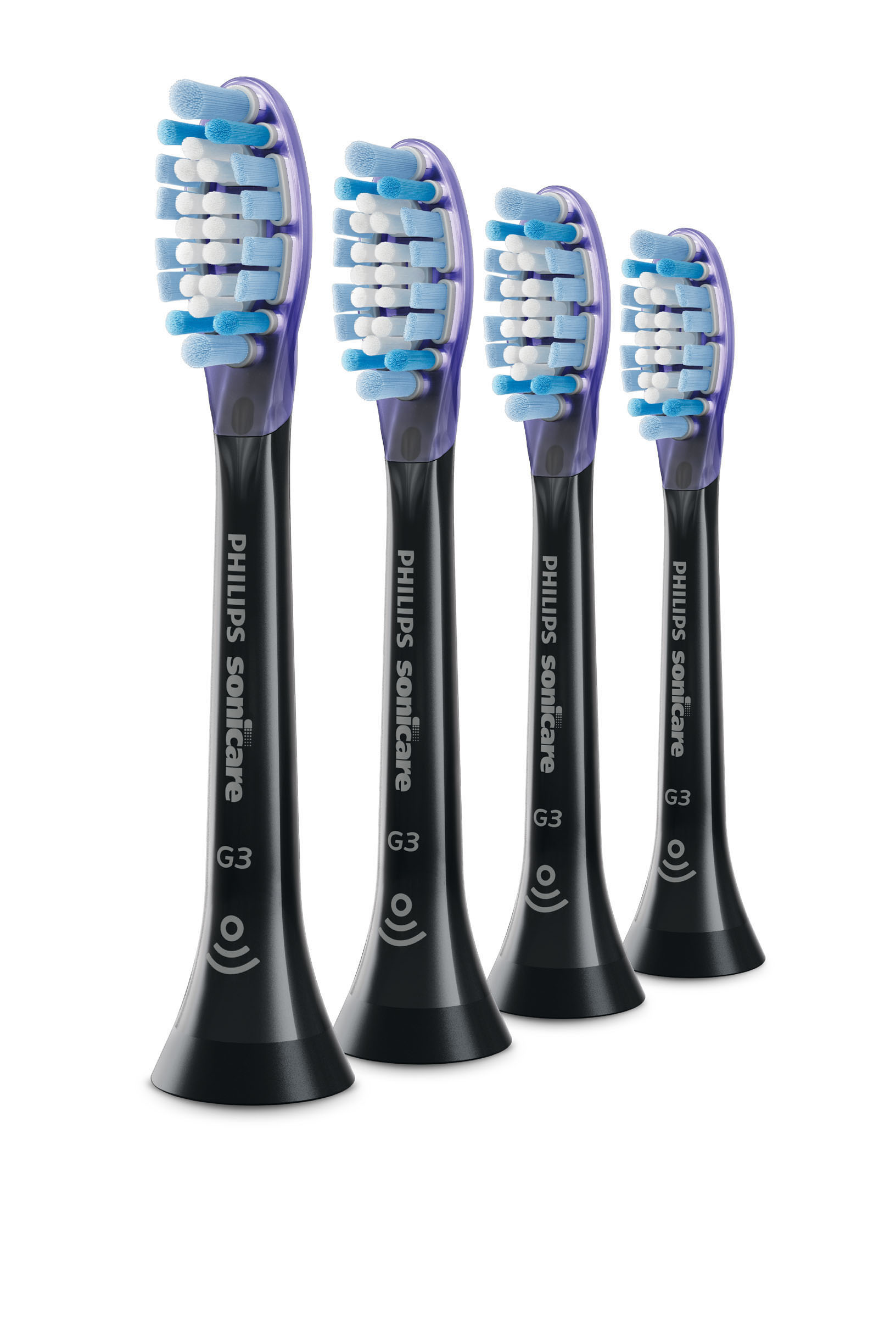Vier Philips Sonicare-Bürstenköpfe. Weiße und blaue Borsten auf lila und schwarzen Griffen. Markenname sichtbar.