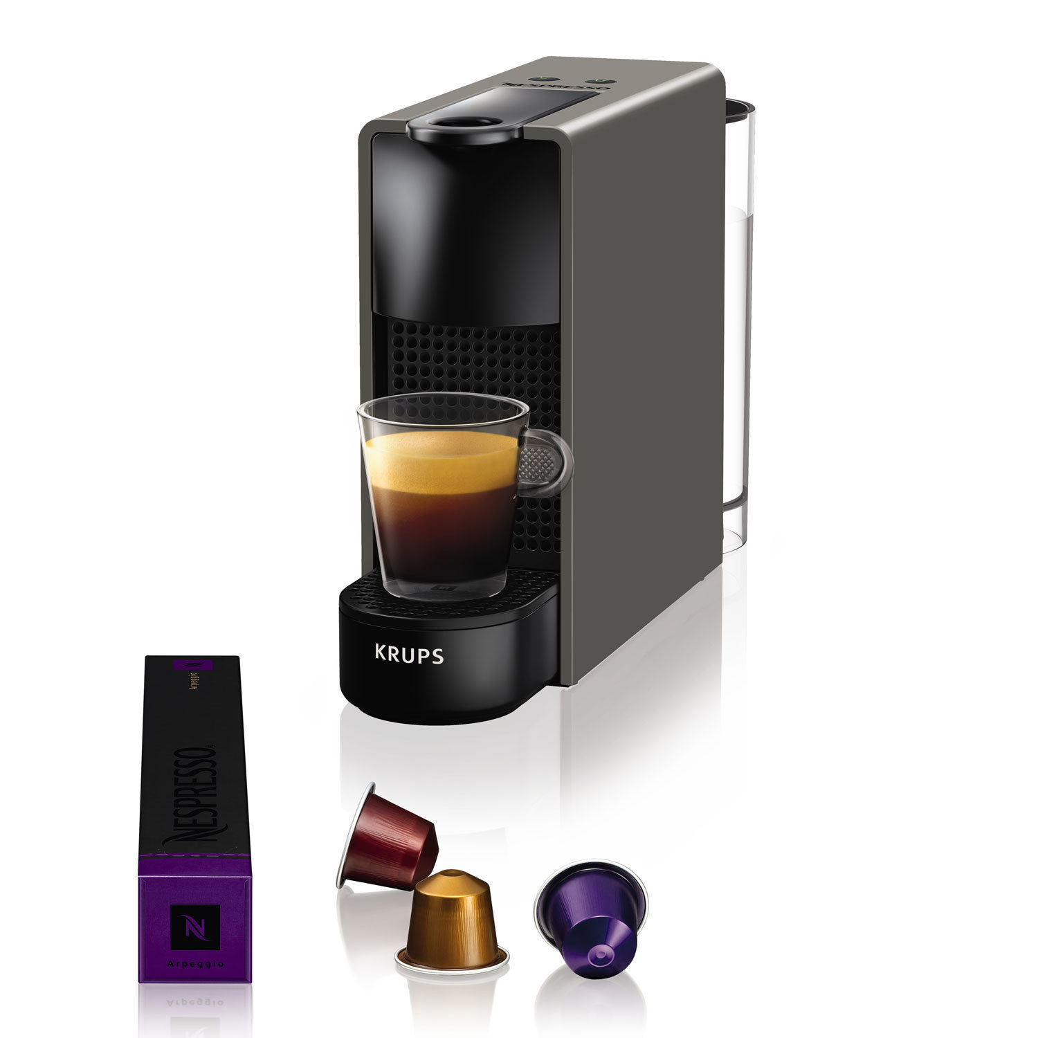Nespresso Kaffeemaschine mit Espresso in Tasse und Kaffeekapseln.