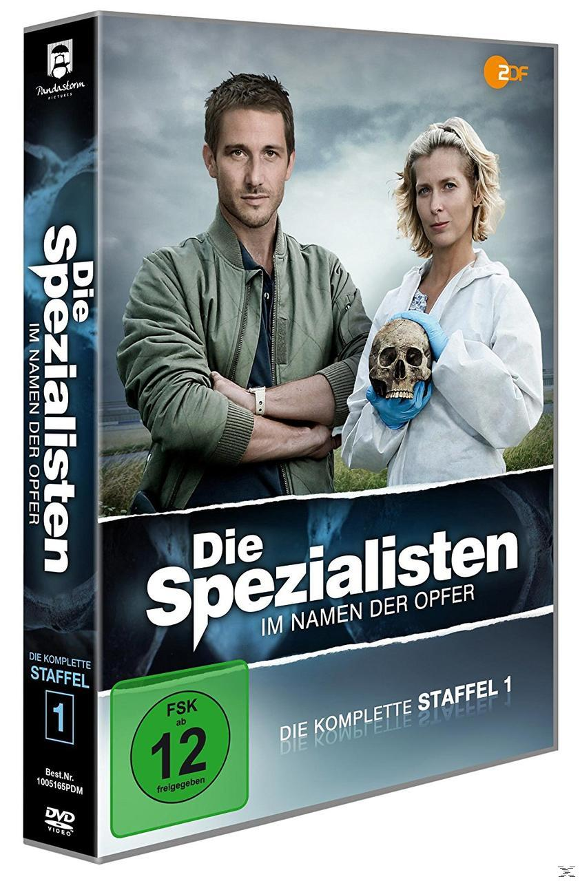 DVD-Hülle von 'Die Spezialisten', mit zwei Personen und einem Schädel auf dem Cover, grüne FSK 12-Bewertung.