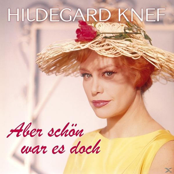 Albumcover einer Frau mit roten Haaren und Strohhut. Roter Text. Gelbes Kleid.