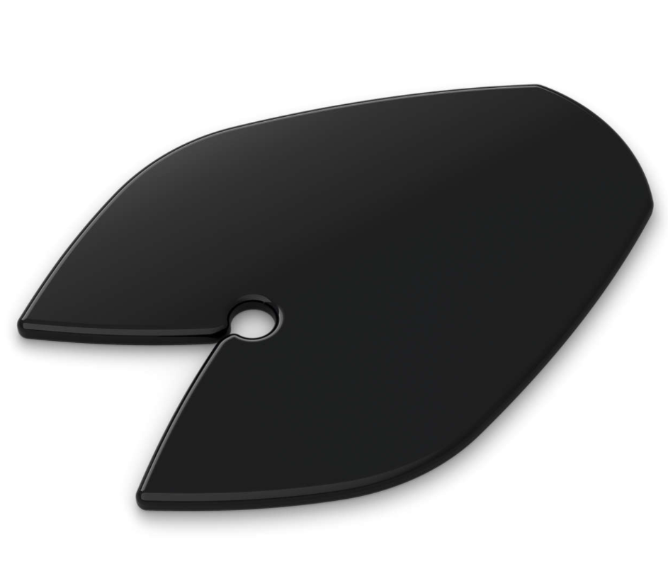 A black, leaf-shaped object with a hole. It is likely a paint palette.