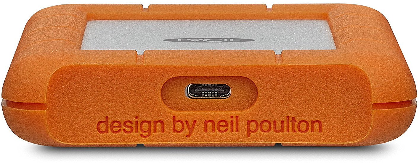 Disque dur externe orange avec port USB-C, le texte dit 'design by neil poulton'.