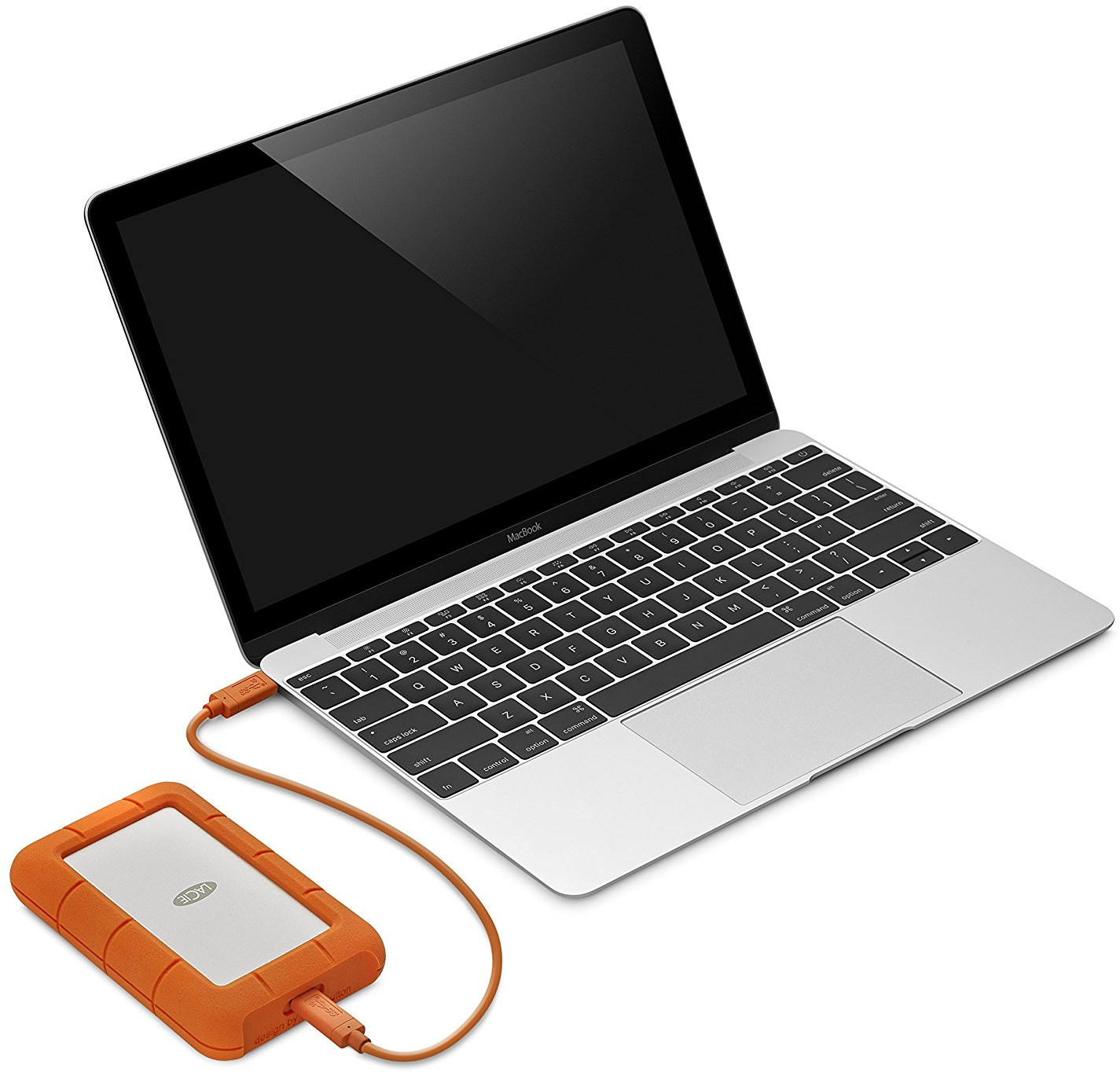 Ordinateur portable connecté à un disque dur externe orange.