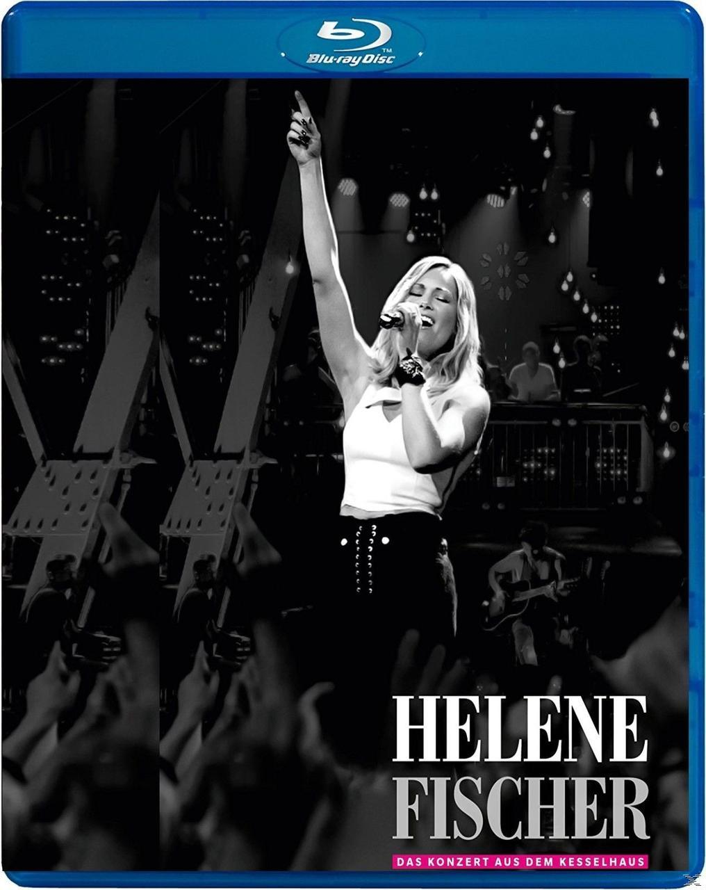 Helene Fischer concert Blu-ray cover. Zangeres op het podium met opgeheven arm, lichten en band zichtbaar.