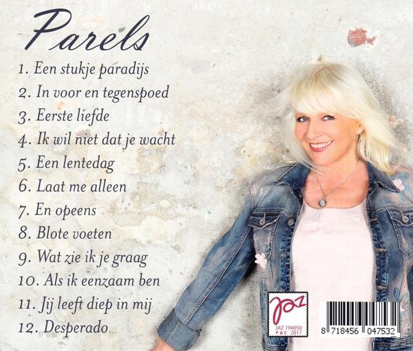 Albumhoes met een lachende blonde vrouw in een spijkerjas. De titel is 'Parels'. Nummers staan vermeld. Een barcode staat rechtsonder.