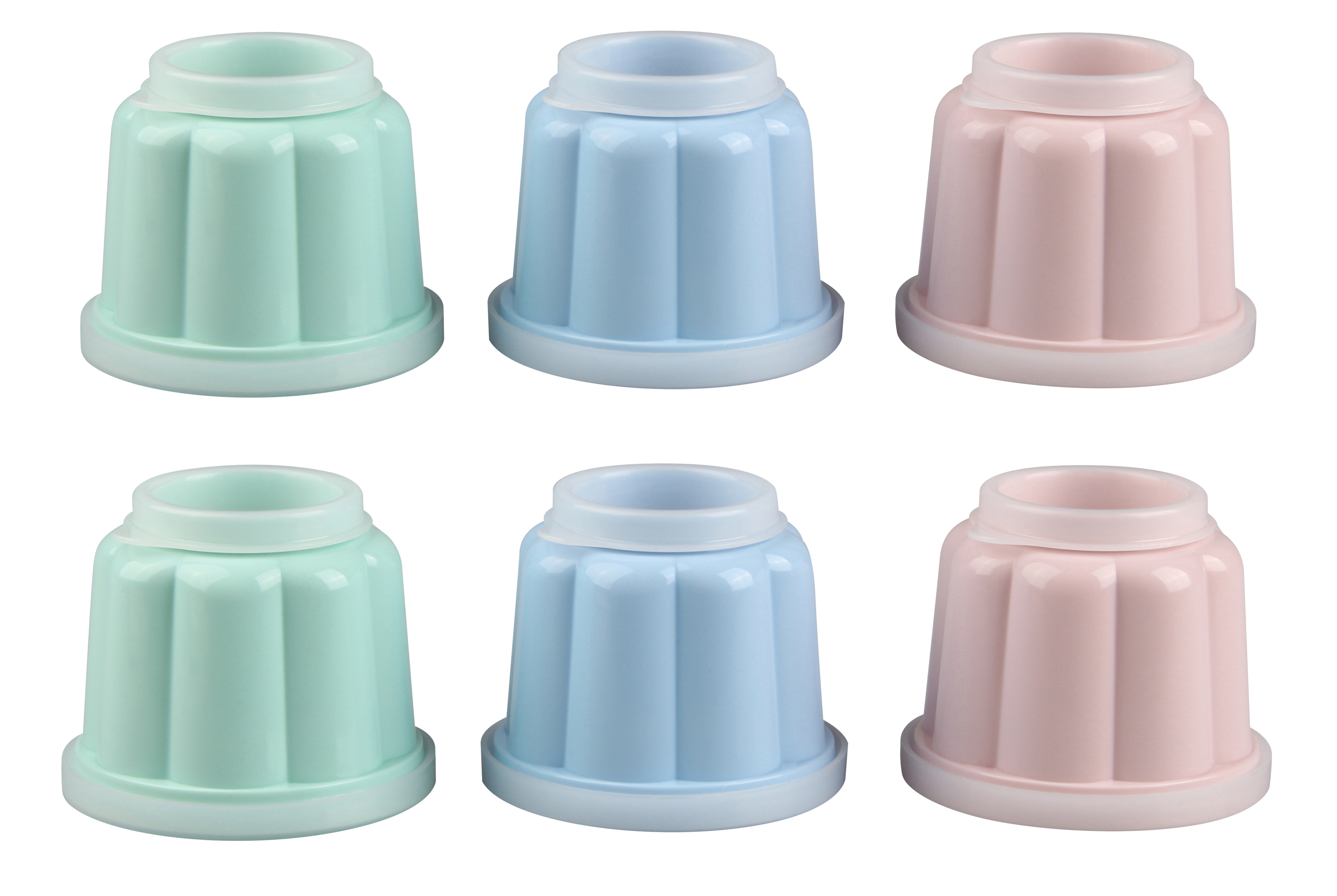 Sechs bunte Geleeformen, grün, blau und rosa.