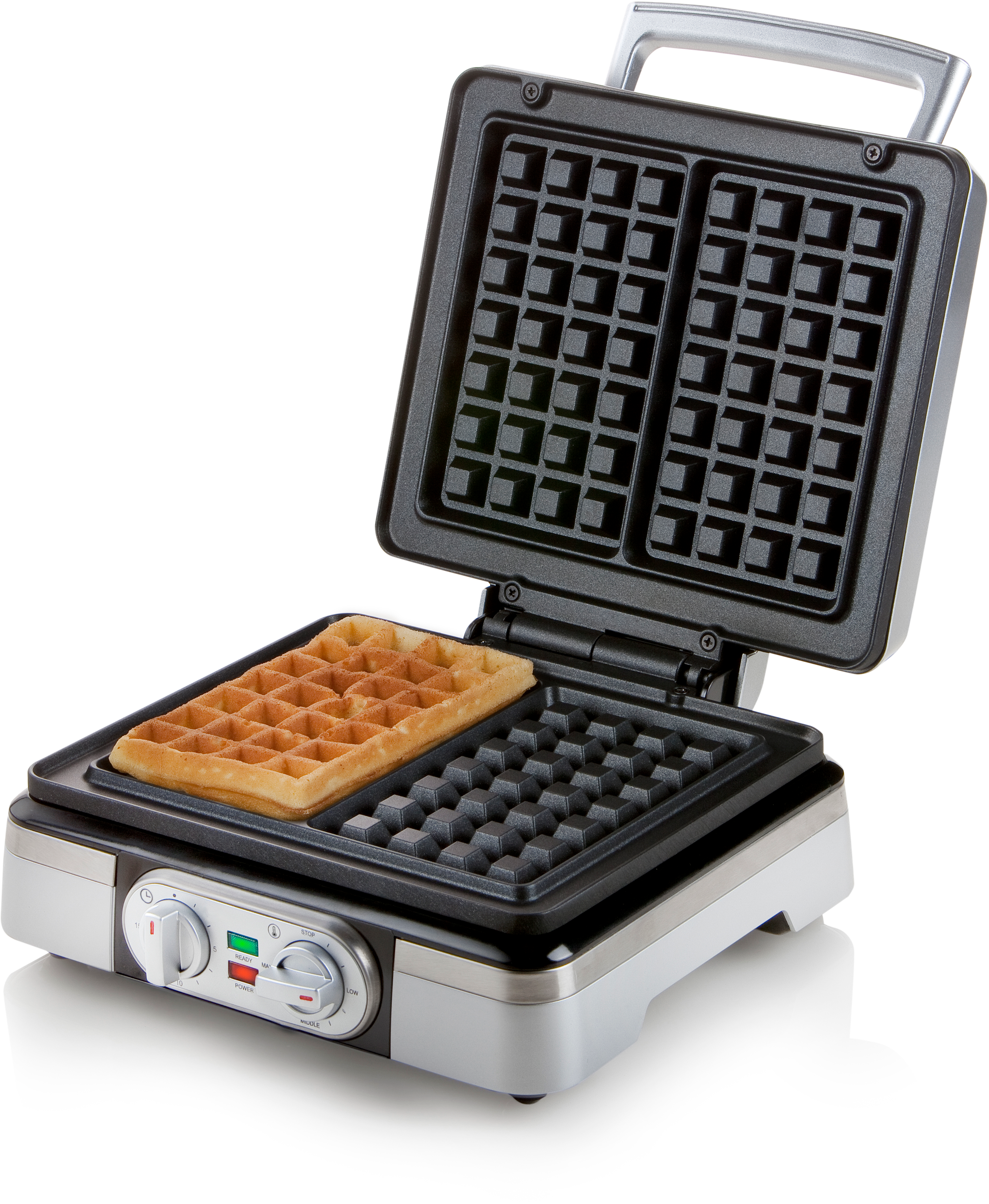 Open waffle maker with a cooked waffle and a grid, black background.