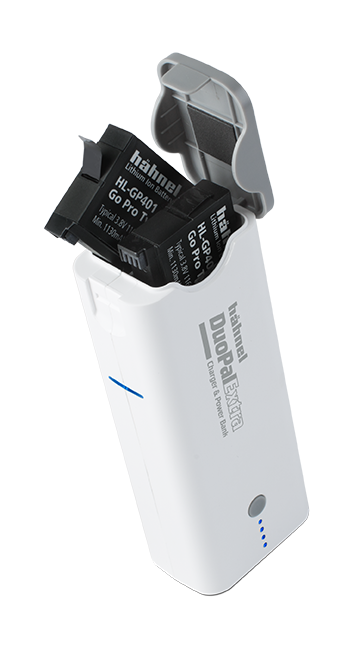 A white Hähnel DuoPal Extra charger with two black batteries inside. The charger has a gray lid and blue indicator lights.