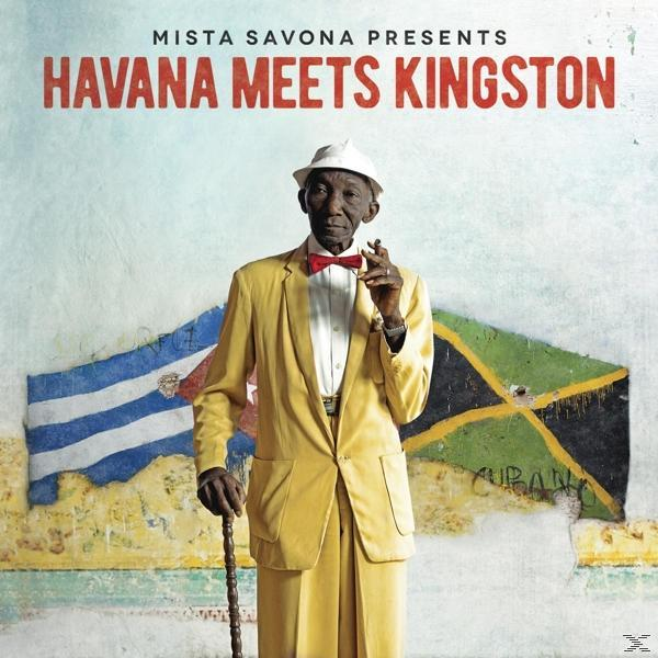 Albumcover: Mann in gelbem Anzug mit Hut und Flagge im Hintergrund.