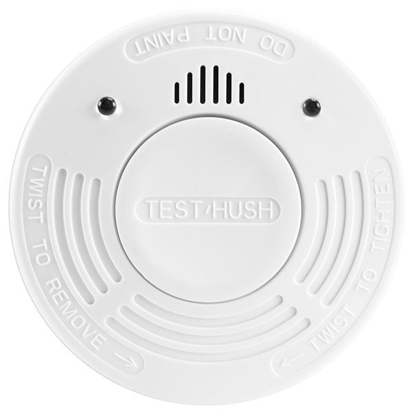 Een witte rookmelder met de tekst 'TEST/HUSH' en 'TWIST TO REMOVE'.