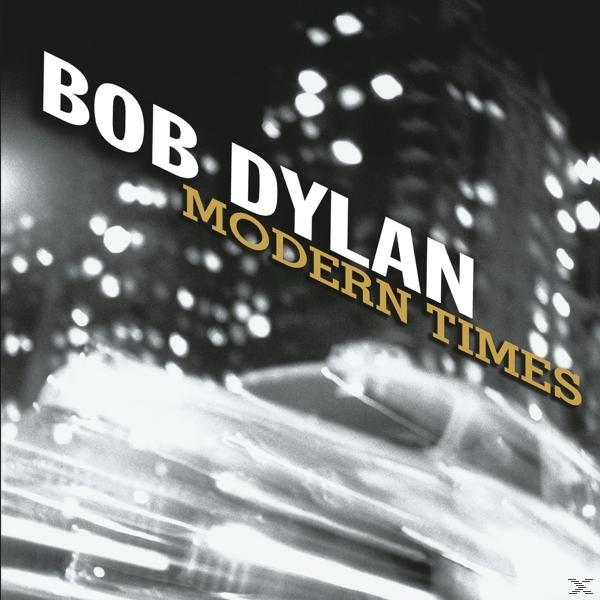 Albumcover: Bob Dylan, Modern Times. In Schwarzweiß befindet sich der Titel auf dem Cover mit verschwommenem Stadt Hintergrund.