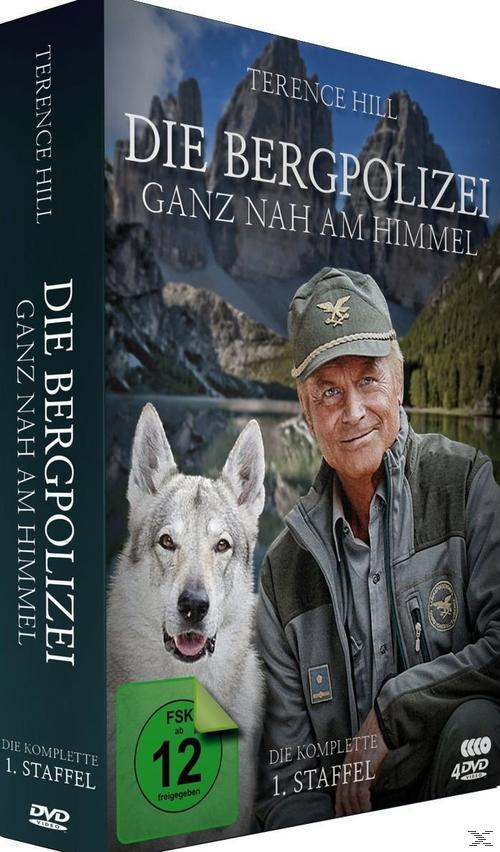 DVD-Hülle mit Mann und Wolf, Berge im Hintergrund.