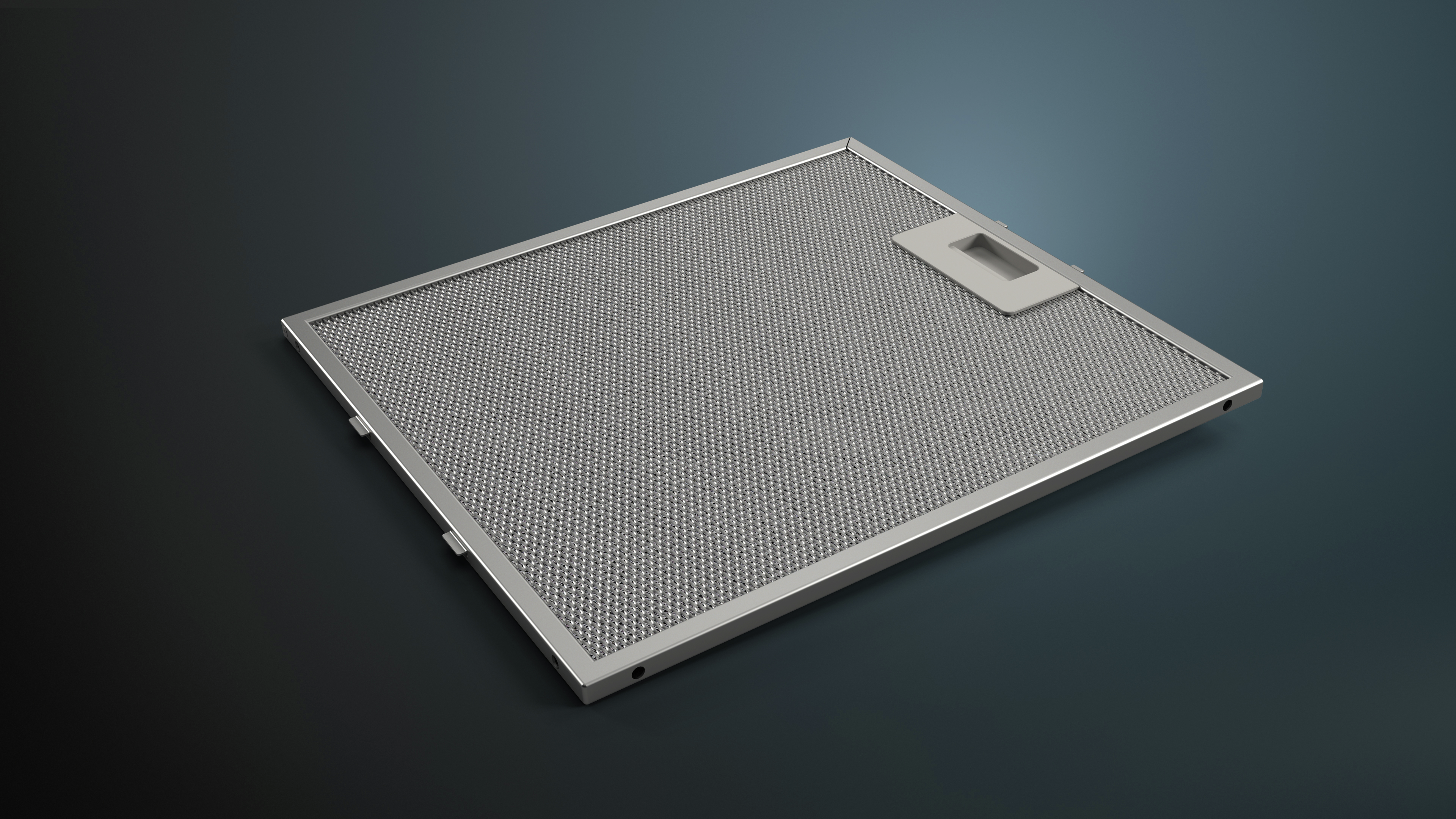 A silver rectangular air filter with a grid pattern, set against a dark gray background.