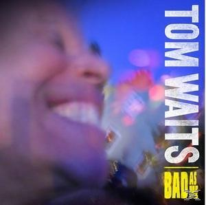 Albumcover von Tom Waits. Der Fokus liegt auf dem lächelnden Künstler. Der Hintergrund ist blau.