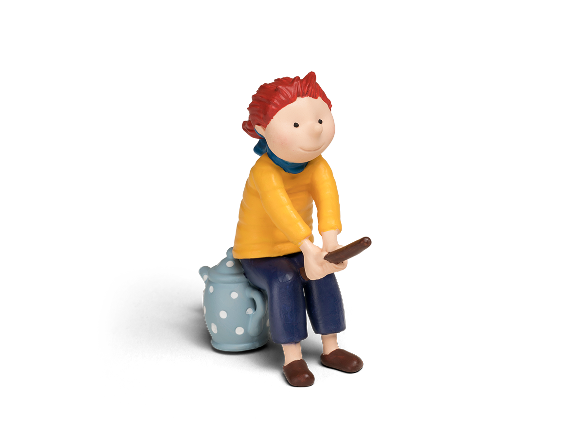 Eine kleine Figur einer Person, die auf einem blauen Topf sitzt.