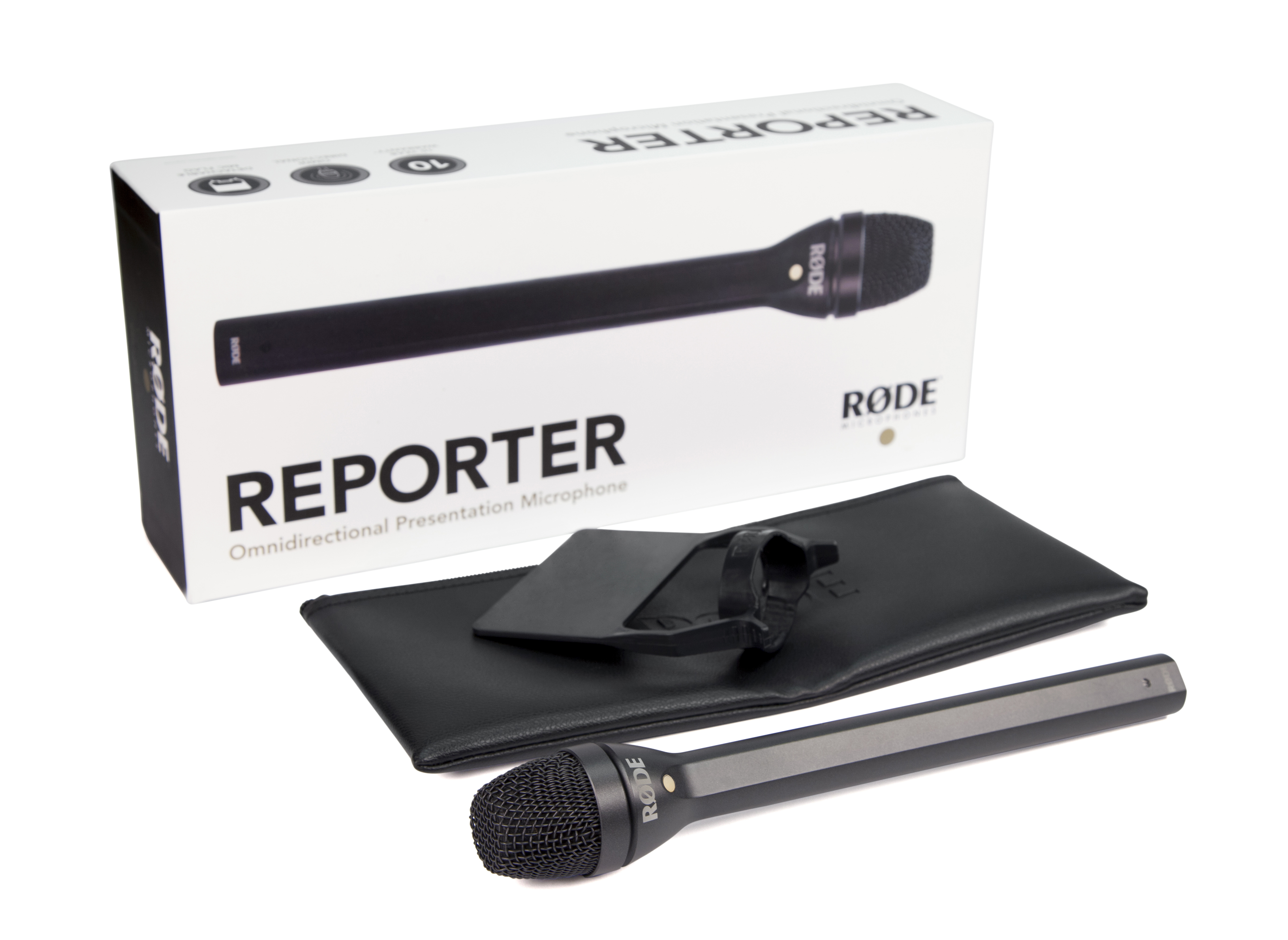 Un microphone noir avec accessoires et emballage sur fond blanc.