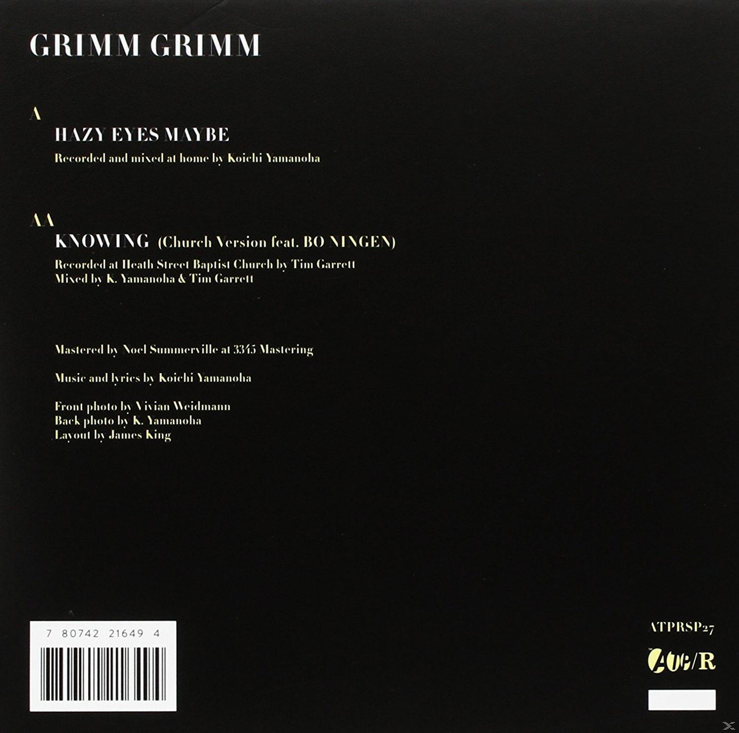 Schwarz-weißes Albumcover mit Text, der Musik und Credits detailliert, auf schwarzem Hintergrund.