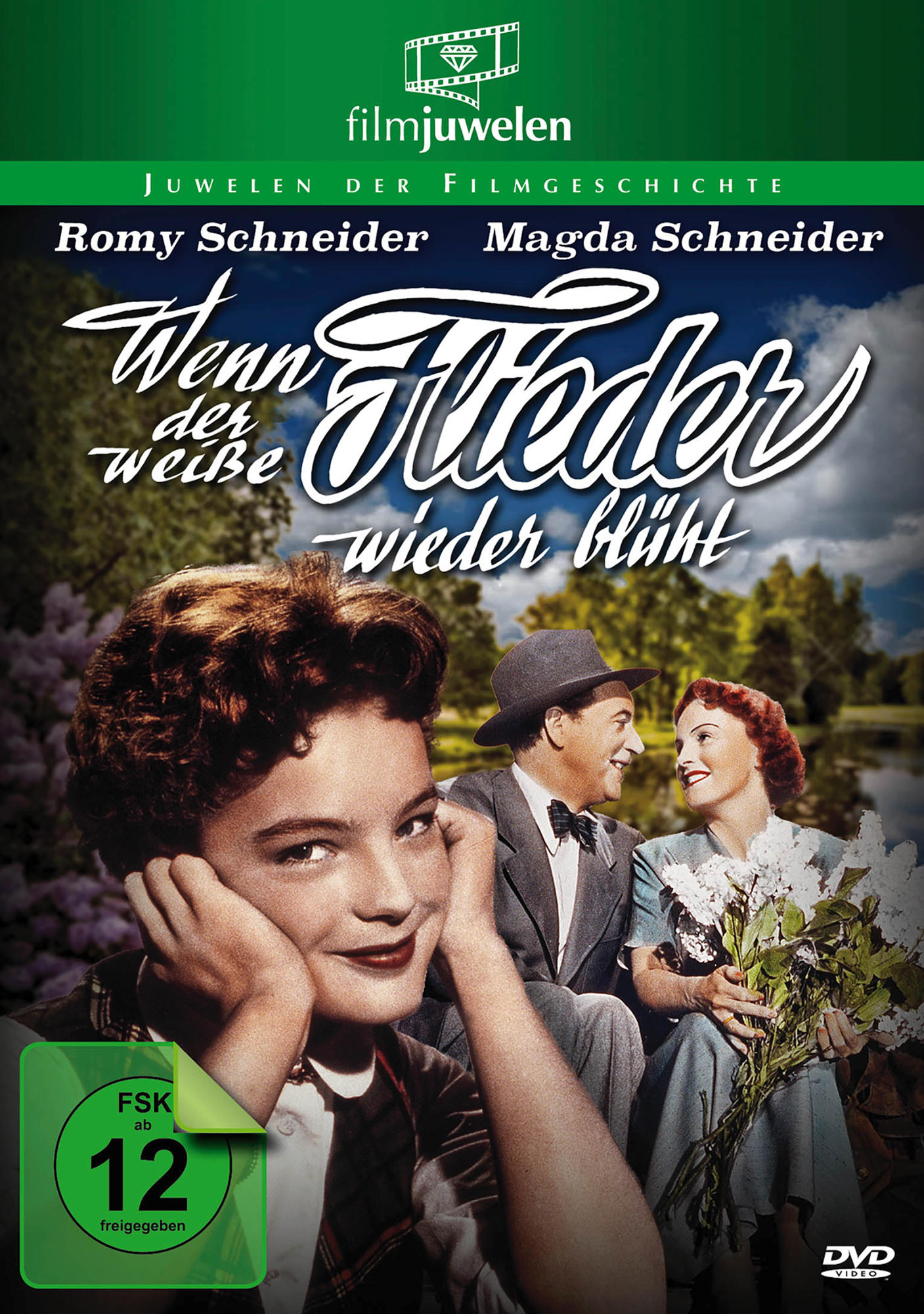 DVD-Cover. Eine Frau, ein Mann und ein Mädchen stehen vor einem See. Filmtitel lautet 'Wenn der weiße Flieder wieder blüht'.