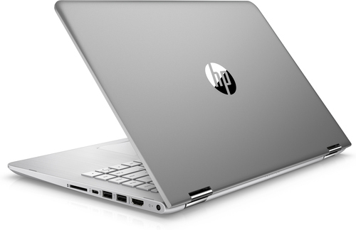 Ein silberner HP-Laptop ist geschlossen und zeigt den Deckel mit Logo und Anschlüsse.