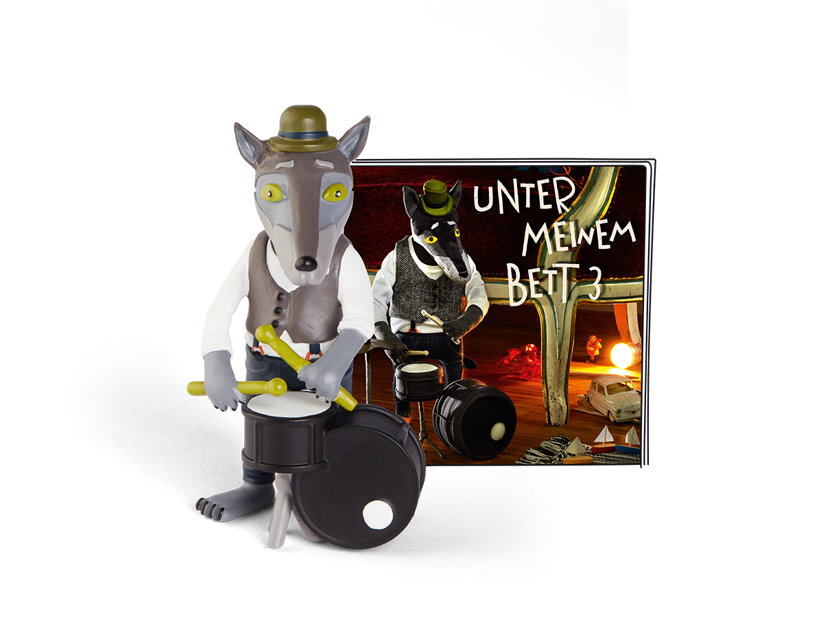 Cartoon-Wolf-Figur, die Schlagzeug spielt, neben einem CD-Cover mit einem Schlagzeug spielenden Wolf. Schwarzer Hintergrund.