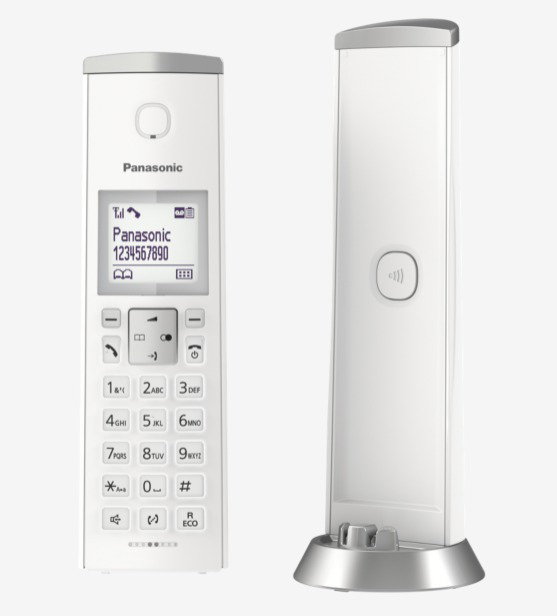 Weißes Panasonic-Telefon, Tastatur, Bildschirm mit Zahlen und Symbolen. Basis mit Ladekontakten.