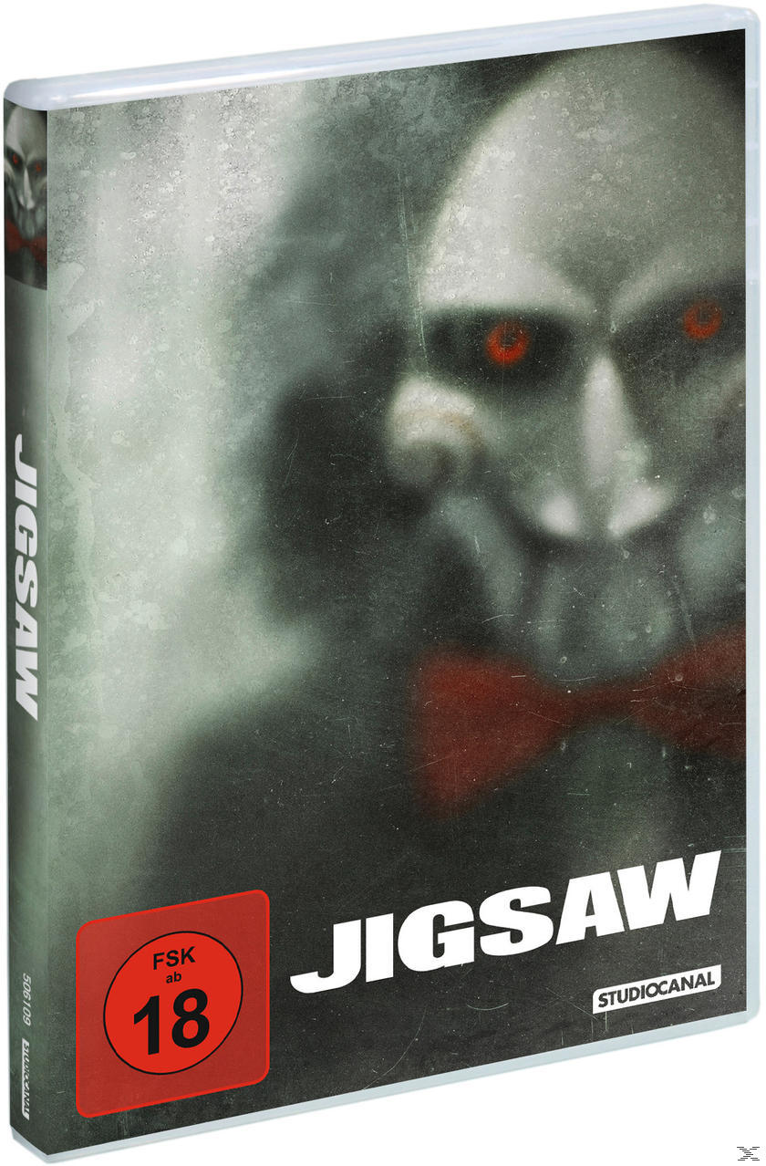 Jigsaw DVD-Cover. Ein verschwommenes Gesicht mit roten Augen und einer roten Fliege. Der Titel wird angezeigt.