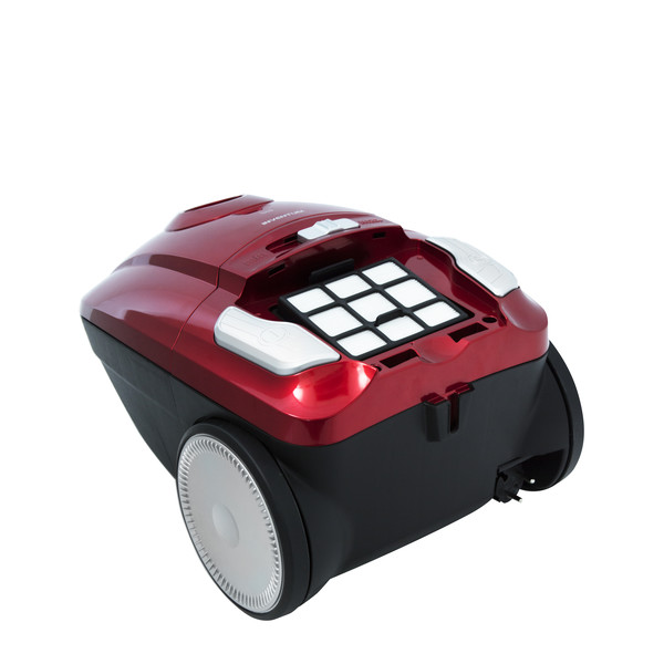 A red and black vacuum cleaner. It has white filters and wheels. The vacuum cleaner is on a white background.