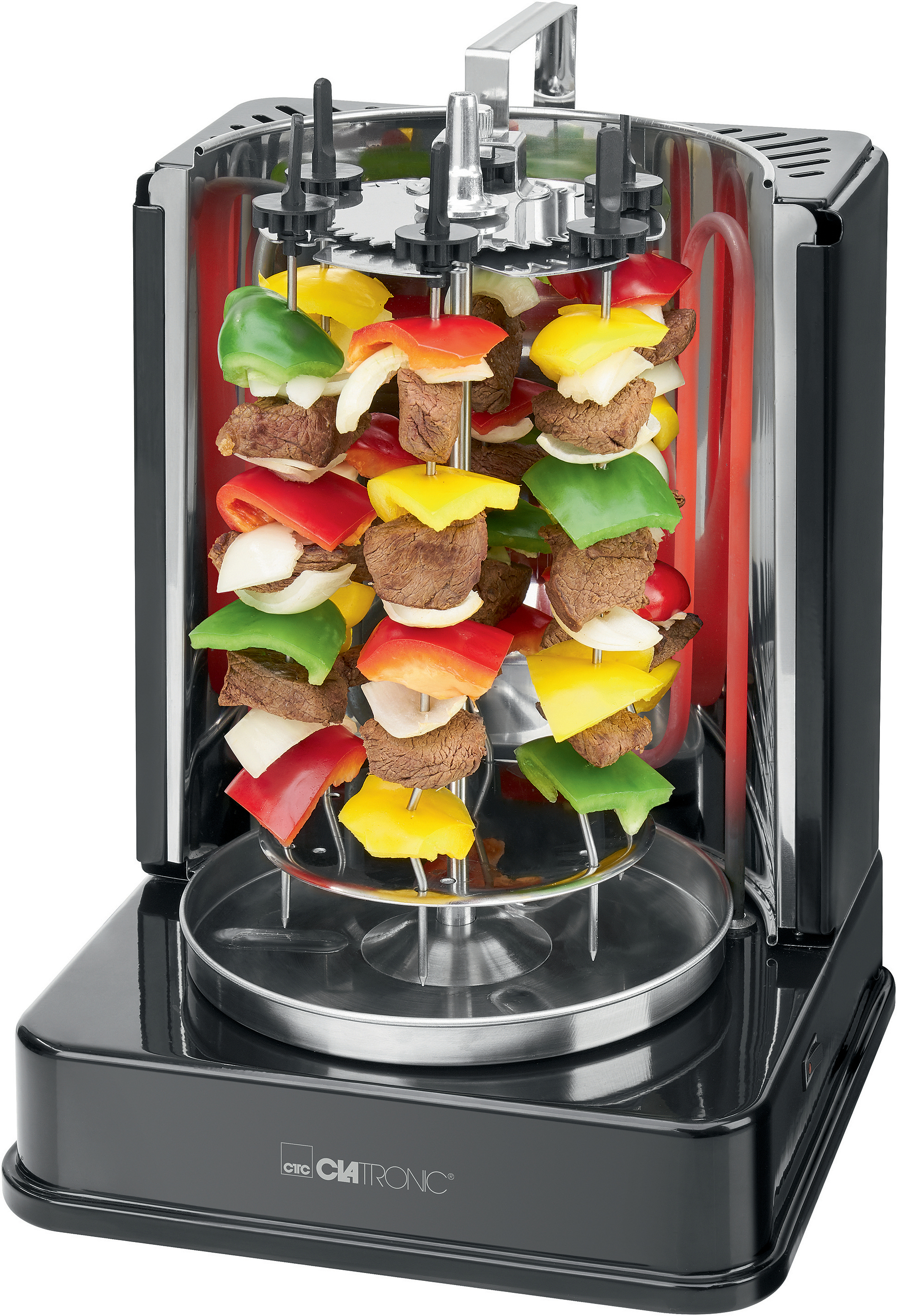 Rotierender vertikaler Grill mit Gemüse und Fleisch. Schwarze Basis, rotes Heizelement sichtbar.