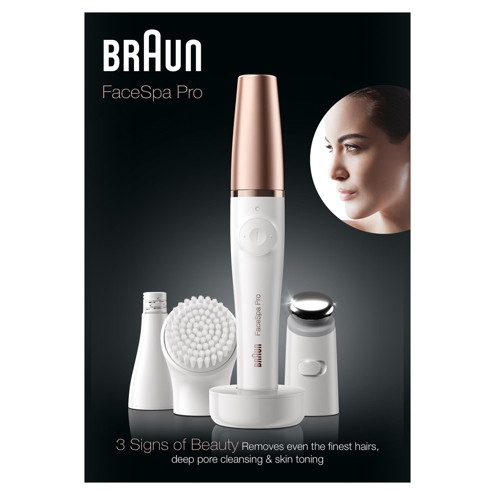Ein Braun FaceSpa Pro-Gerät mit Zubehör. Es ist weiß und goldfarben vor schwarzem Hintergrund.