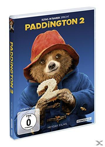 Paddington 2 DVD-Cover. Paddington-Bär mit Hut und Mantel, hält ein Brotsandwich.
