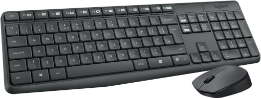 Un clavier et une souris gris foncé sur une surface noire. Le clavier a de nombreuses touches.