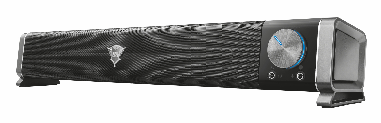 Barre de son noire avec façade en mesh, accents argentés, bouton de volume et logo Trust GXT.