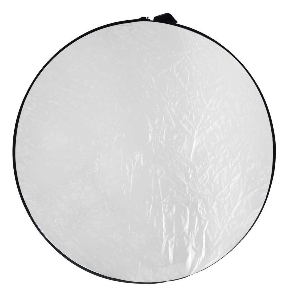 A silver and white round reflector. The surface is crumpled.