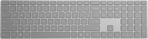 Eine hellgraue Tastatur mit weißen Tastenkappen. Zahlen, Buchstaben und Sondertasten sind sichtbar.