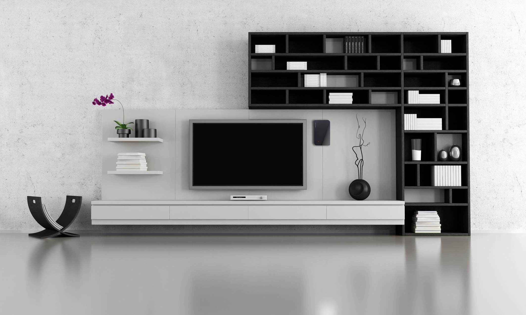 Modernes Wohnzimmer mit weißem und schwarzem Entertainment-Center, großem TV und neutralen Wänden.