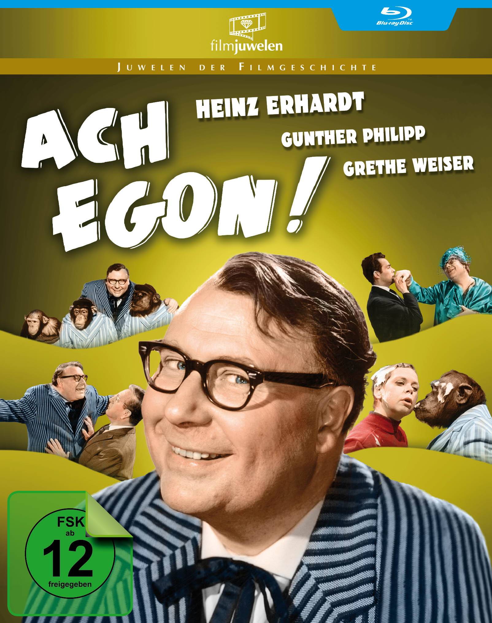 Filmcover mit einem Mann, der mit Brille lächelt. Affen im Hintergrund. Text: Ach Egon!
