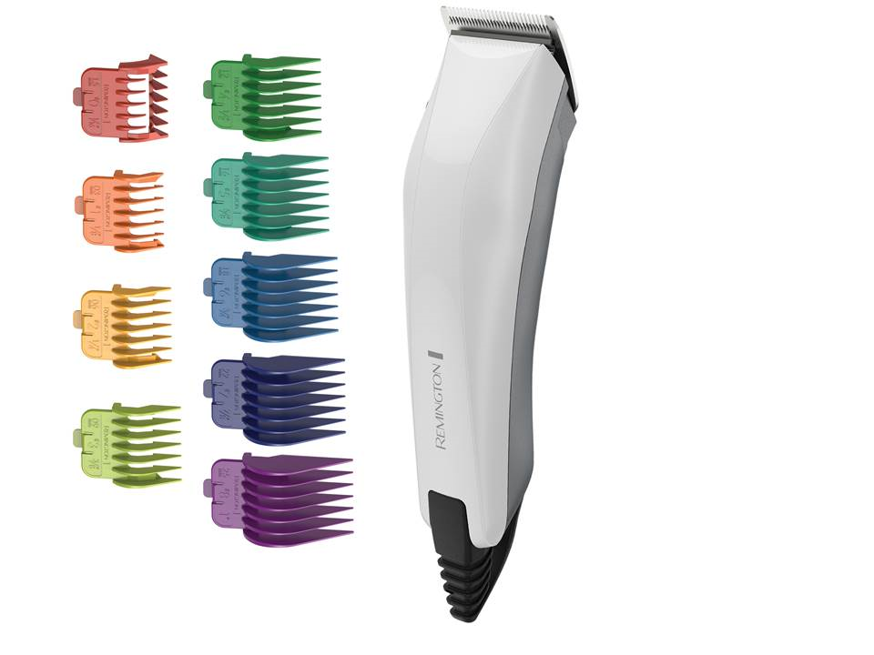 White and gray Remington hair clipper with various colored comb attachments.